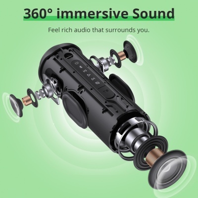 Coluna portátil preta desmontada com componentes internos visíveis e texto promocional em fundo verde