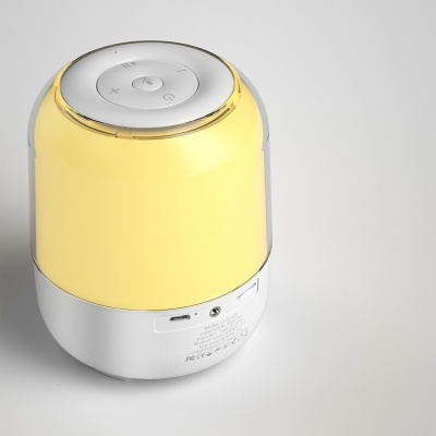 Coluna portátil branca com luz LED amarela e botões no topo