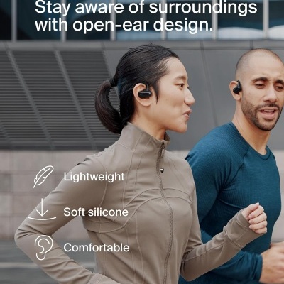 Duas pessoas a correr com auriculares sem fios de design aberto