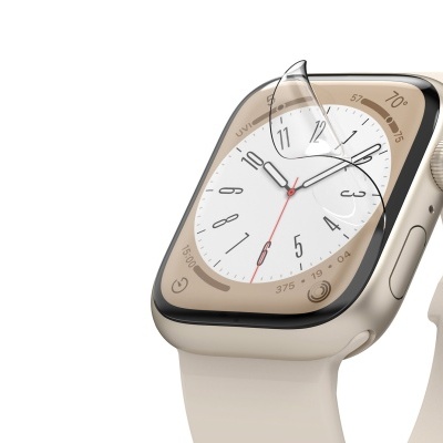 Relógio inteligente dourado com bracelete bege e mostrador analógico branco.