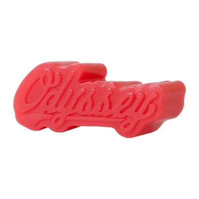 Peça plástica vermelha com a palavra Odyssey em relevo