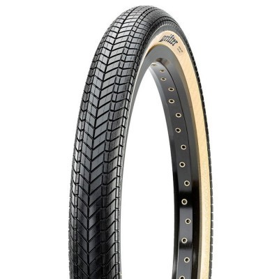 Pneu de bicicleta preto com lateral bege e aro preto com furos para raios