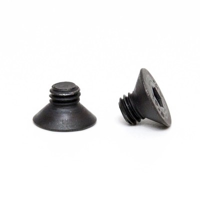 Parafusos pretos de metal com cabeça cónica sobre fundo branco