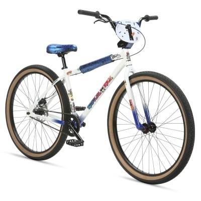 Bicicleta branca e azul com detalhes em azul e pneus castanhos