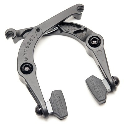 Freio de bicicleta metálico cinza com texto Odyssey