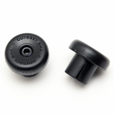 Protetores negros Odyssey BMX para bicicletas sobre fundo branco