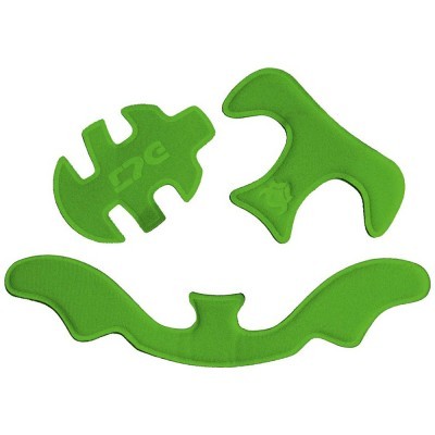 Três almofadas verdes de espuma com formas anatómicas distintas