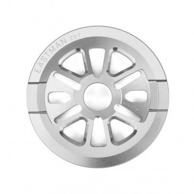 Disco metálico circular prateado com texto EASTMAN 25T