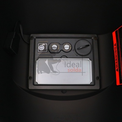 Painel de controlo preto com botões e vidro transparente com texto 'ideal solda'