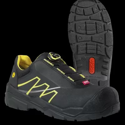 Calçado de segurança preto e amarelo com sola antiderrapante com etiqueta vermelha 