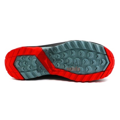 Sola de sapato vermelha e cinza vista de baixo