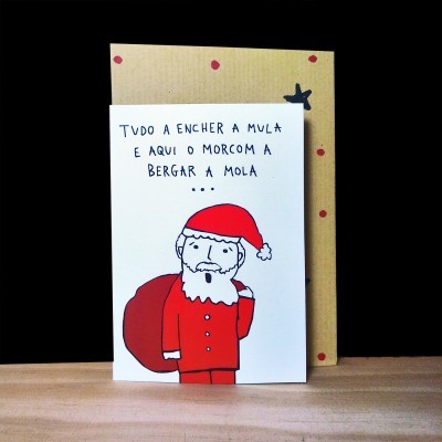 Cartão de Natal com Pai Natal e texto manuscrito em português