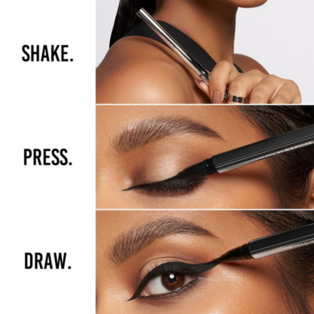 Caneta Delineadora Linework Onyx Danessa Myricks Beauty Pessoa aplicando eyeliner preto líquido com os passos SHAKE, PRESS, DRAW escritos ao lado.
