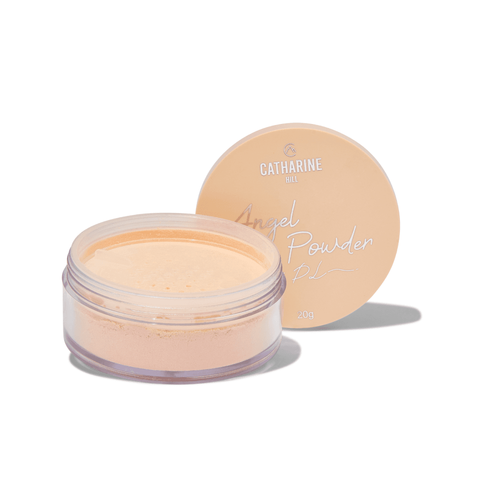 Pó Solto Facial Angel Powder by Pri Lessa - Catharine Hill Pó solto de maquilhagem numa embalagem redonda com tampa beige e texto da marca e produto