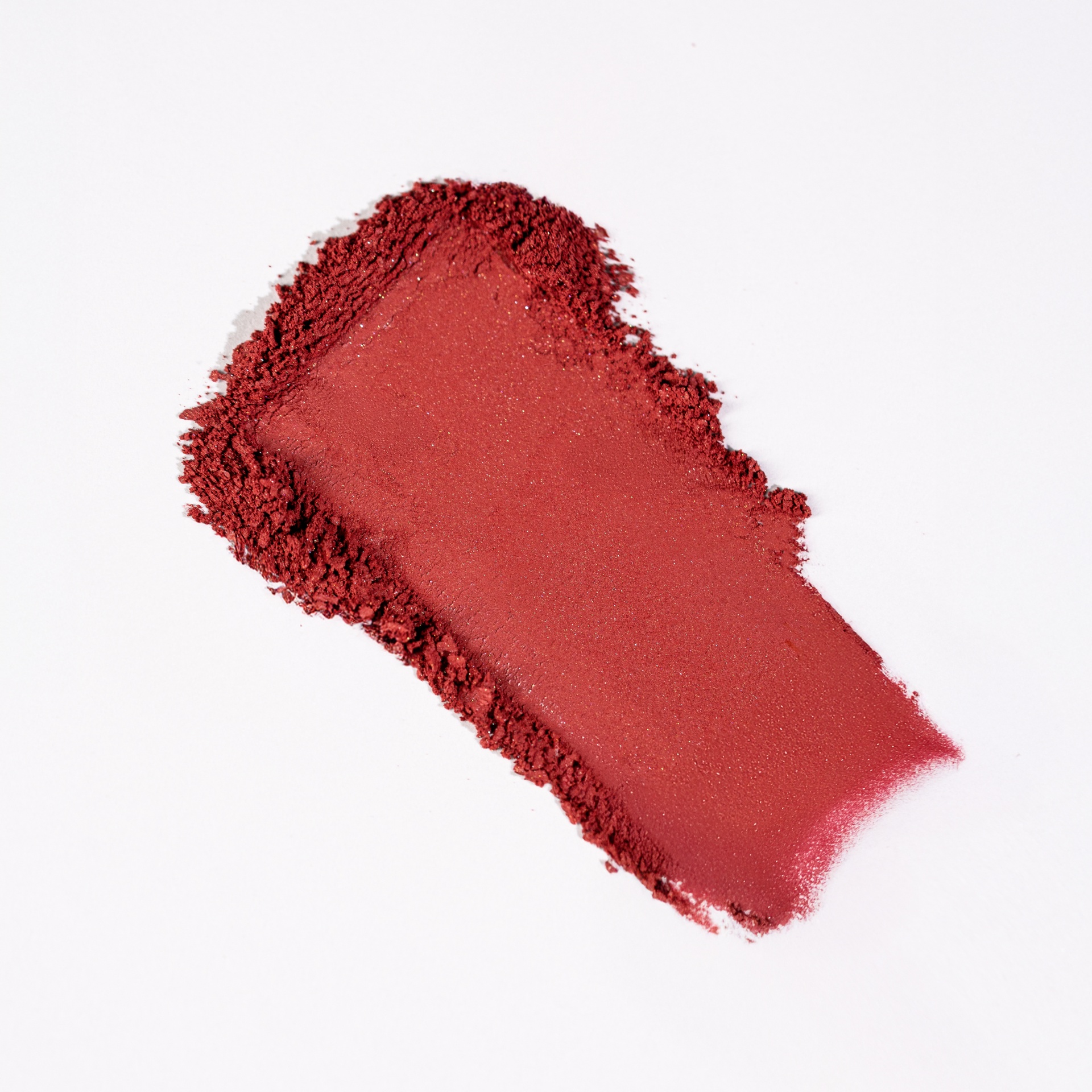 Blush Compacto Lara Beauty Pó compacto ou sombra vinho com brilho em superfície branca
