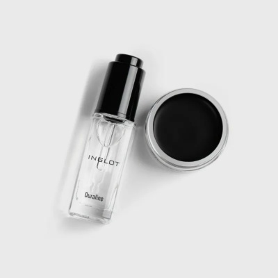 Produtos de maquilhagem Inglot frasco transparente e recipiente redondo preto