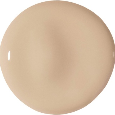 Gota de líquido creme bege claro com textura cremosa