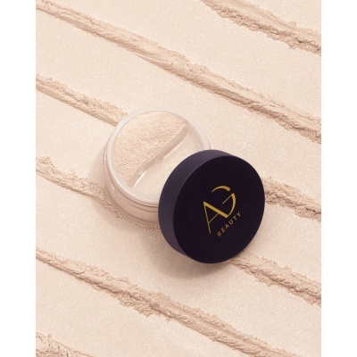 Frasco de pó solto bege claro com tampa preta AG BEAUTY