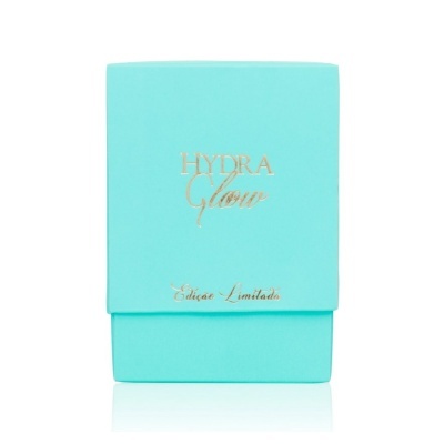 Embalagem turquesa com texto dourado HYDRA Glow e Edição Limitada