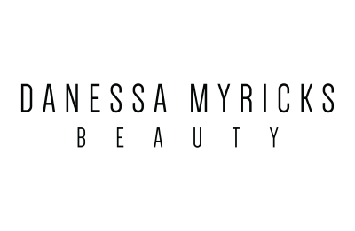 Logótipo DANESSA MYRICKS BEAUTY em texto preto sobre fundo branco
