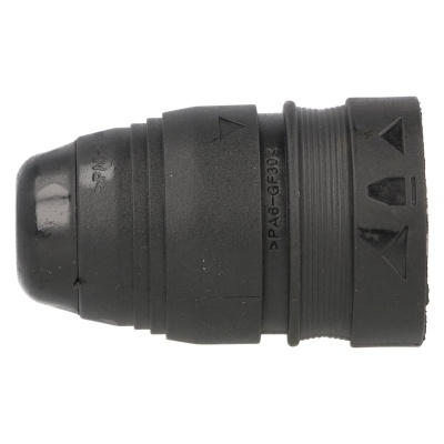 Conector elétrico preto cilíndrico de plástico com inscrições e setas