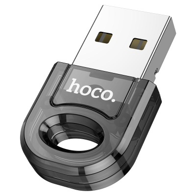 Pen drive USB cinzento transparente com o texto hoco.