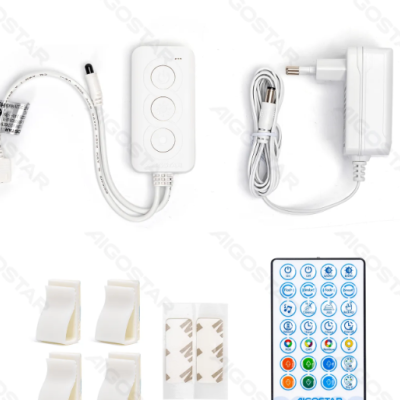 Conjunto de acessórios eletrónicos com controlador, comando, adaptador e suportes em fundo branco