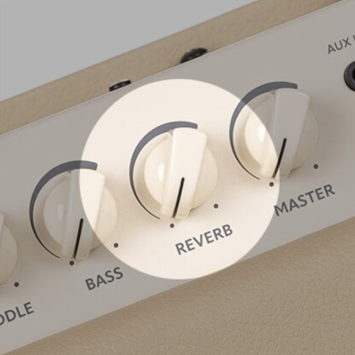 Botões rotativos para controlar áudio em equipamento musical bege