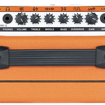 Amplificador de guitarra laranja com botões pretos e pega preta