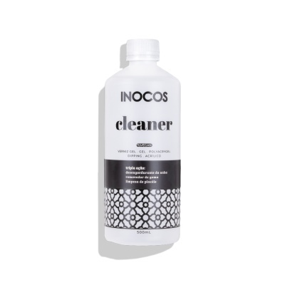 Frasco branco de plástico de 500ml com rótulo preto e branco do produto INOCOS cleaner para unhas.