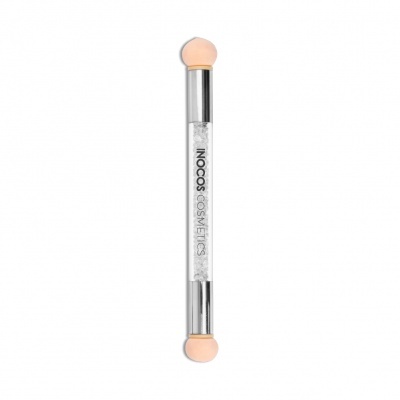 Produto cosmético para unhas cilíndrico com extremidades bege e corpo transparente com texto INOCOS COSMETICS