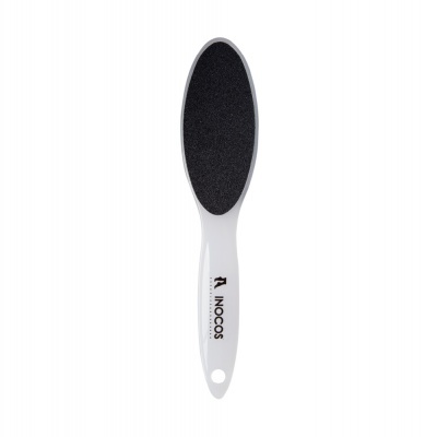 Lima para pés branca com superfície preta e marca INOCOS