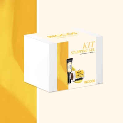 Embalagem branca e dourada do Kit Stamping Gel INOCOS com tubo preto e rolo amarelo do produto