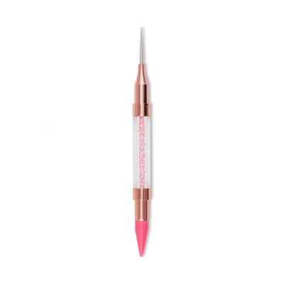 Esmaltes de unhas com ponta fina branca e contra-ponta rosa com corpo transparente e esferas cor-de-rosa