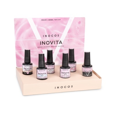 Conjunto de vernizes INOCOS INOVITA para unhas numa embalagem de exposição