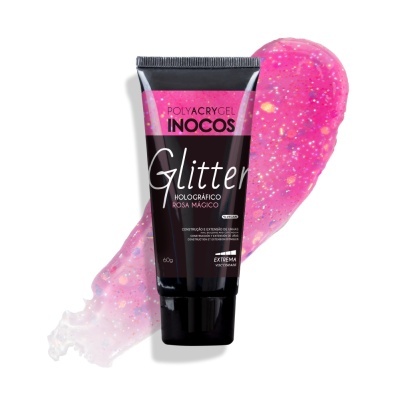 Tubo preto de gel para unhas Inocos Glitter Rosa Mágico com aplicação do produto rosa com glitter ao fundo