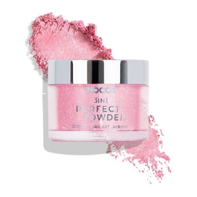 Frasco de pó rosa para unhas com tampa prateada e pó espalhado em fundo branco