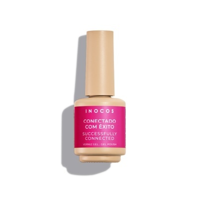 Frasco de verniz gel para unhas INOCOS com rótulo rosa e tampa bege.