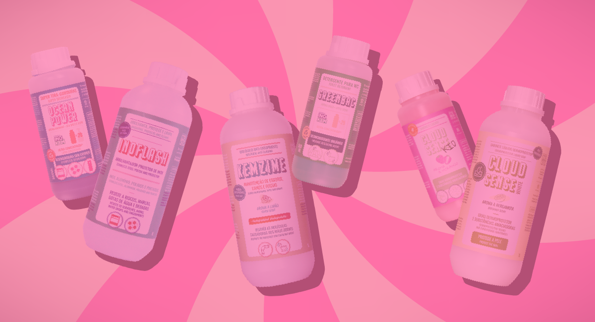 Seis frascos de suplementos alimentares coloridos em fundo rosa espiral