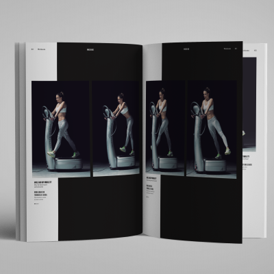 Revista aberta com fotografias de mulher a usar equipamento de ginásio fundo preto