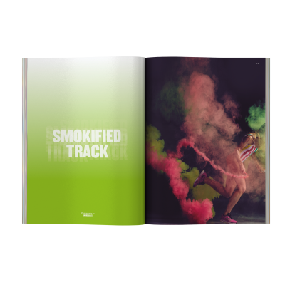 Livro aberto com página verde texto e página com imagem de pessoa e fumo colorido