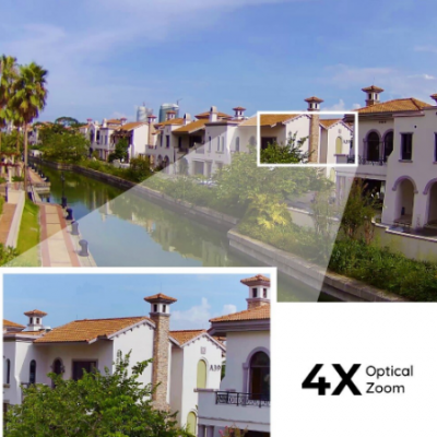 Vista de casas mediterrânicas junto a um canal com zoom óptico 4X