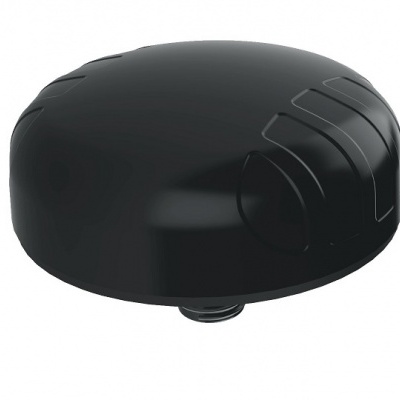 Objeto redondo preto com detalhes em relevo sobre fundo branco