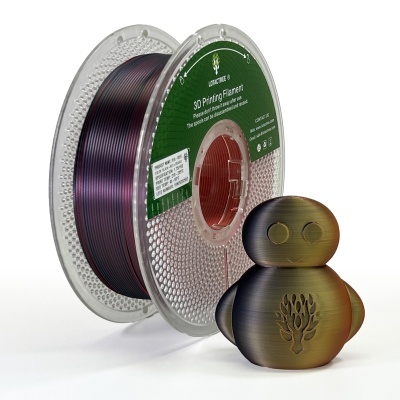 Rolo de filamento para impressão 3D e boneco impresso em 3D em tons dourados