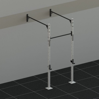 Estrutura de barra fixa metálica branca e preta instalada numa parede em chão preto