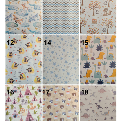 Tecido infantil com várias estampas coloridas