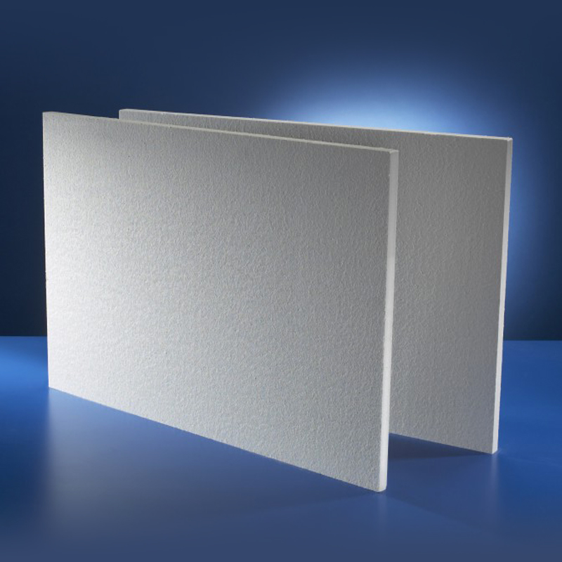 Placa Rígida em Fibra RCF 1430°C Unifrax Duraboard 140ZK Dois painéis brancos texturizados em forma de V sobre superfície azul