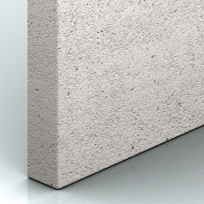 Painel branco com textura pontilhada em ângulo sobre superfície cinzenta