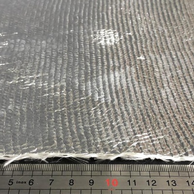 Superfície texturizada cinza metálico com régua em centímetros embaixo