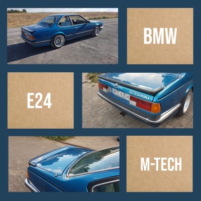 BMW clássico azul E24 com emblema M-TECH e texto visível